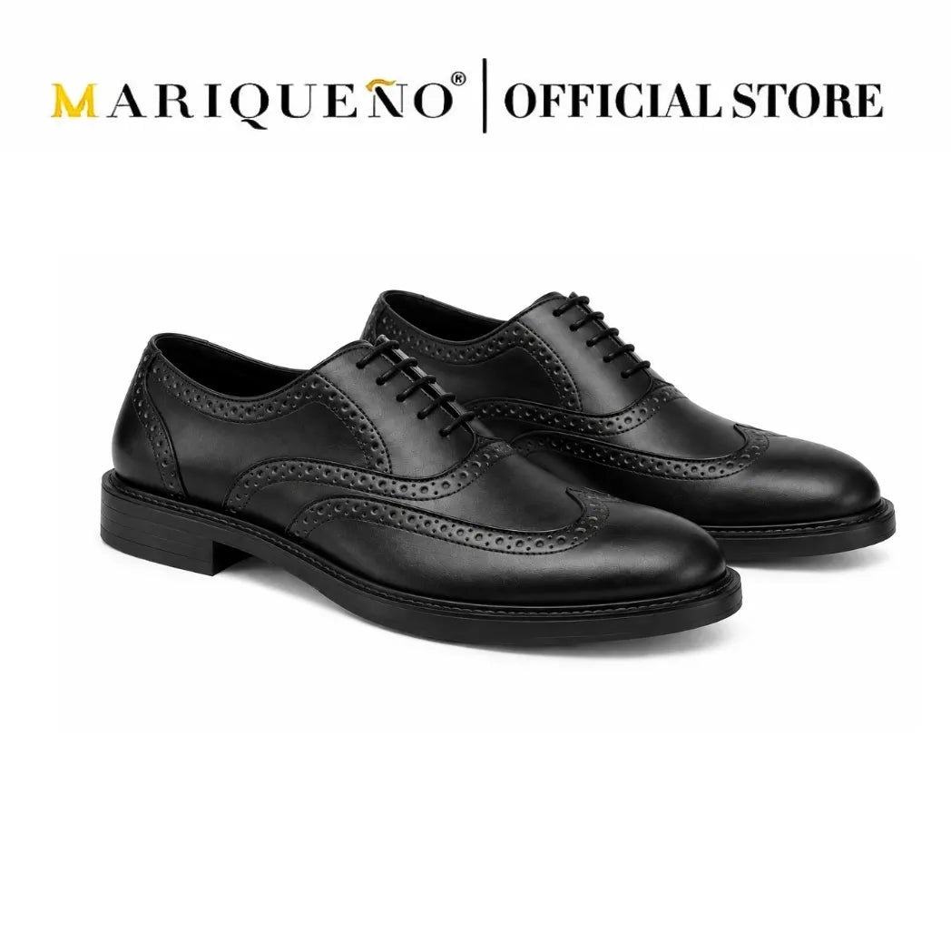 Black wingtip oxford shoes with 'Mariqueno' branding on a white background
#color_black
