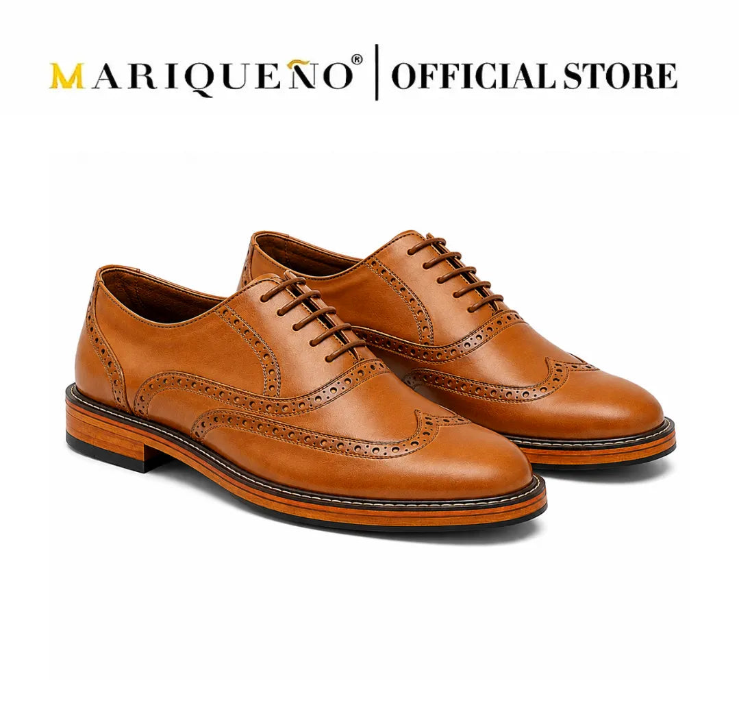 Pair of tan brown leather shoes with 'Mariqueno' branding on a white background
#color_tan