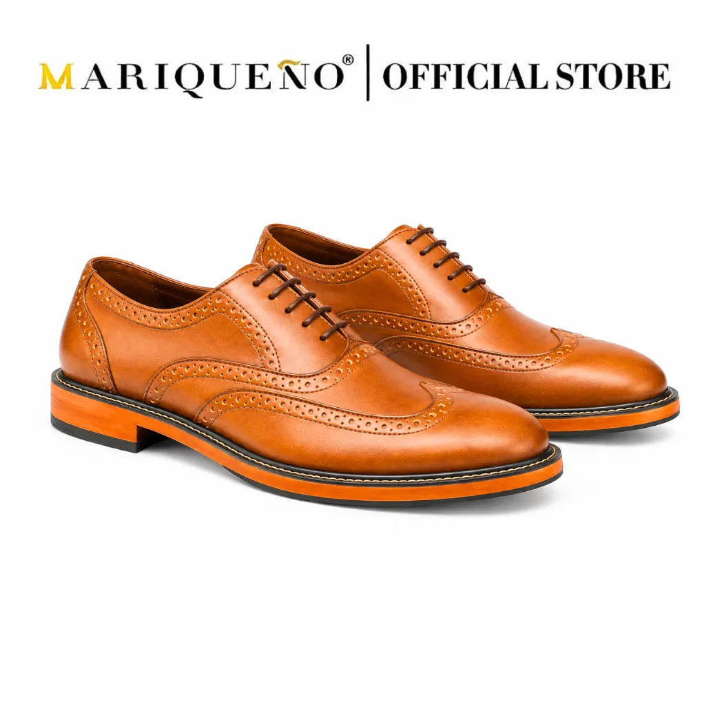 Pair of tan brown leather shoes with 'Mariqueno' branding on a white background
#color_tan