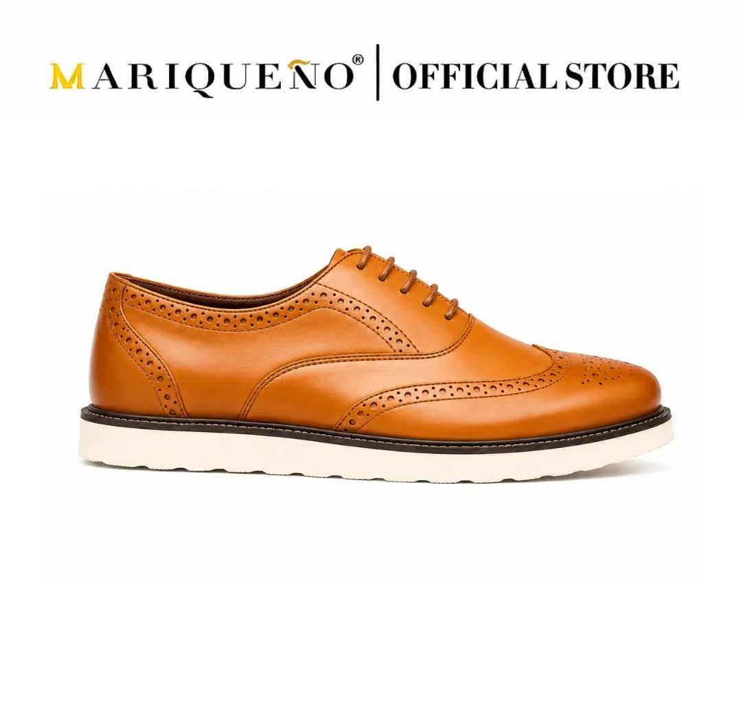 Tan brown leather shoe with white rubber sole on a white background, branded as Mariqueno.
#color_tan