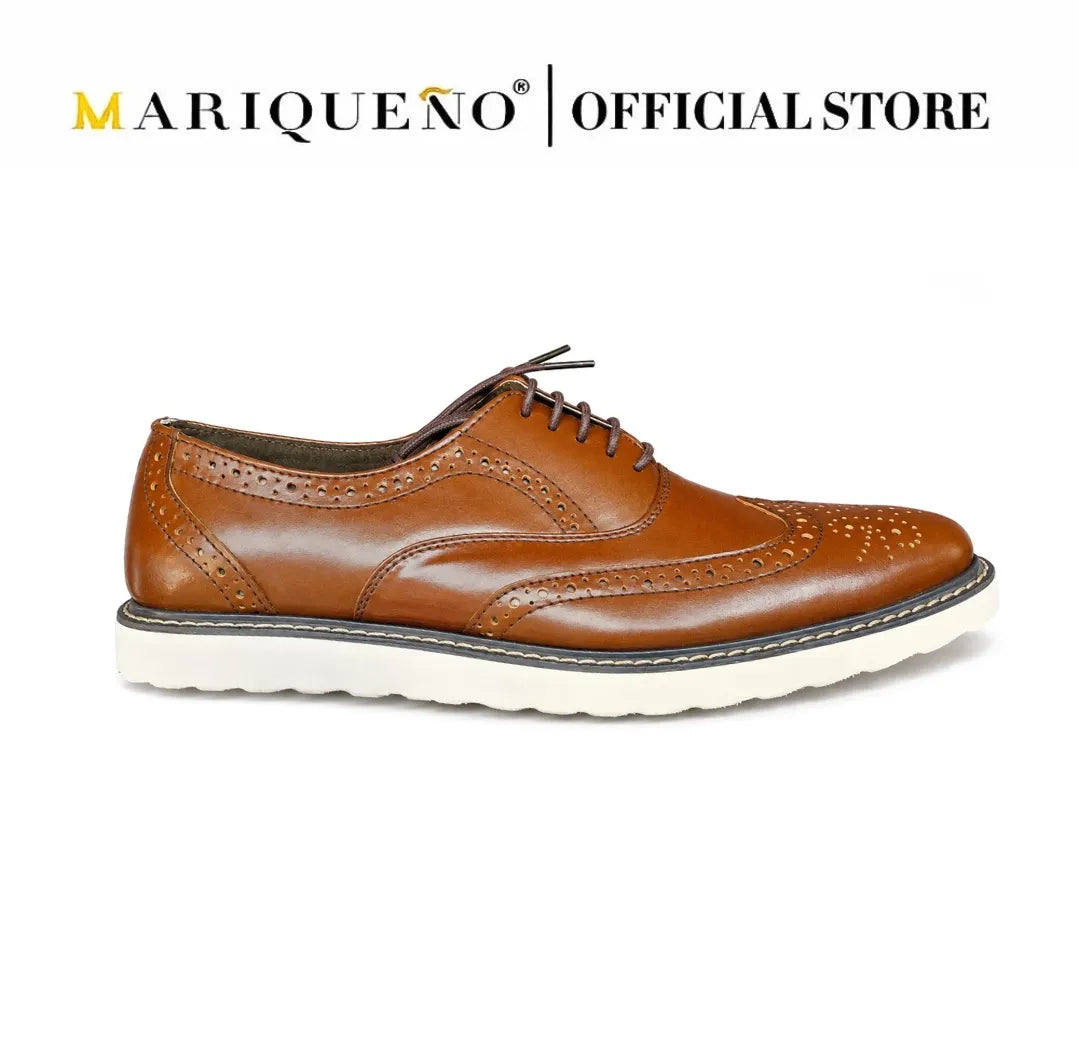 Walnut brown leather shoe with white rubber sole on a white background, branded as Mariqueno.
#color_walnut