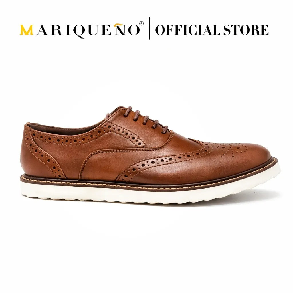 Walnut brown leather shoe with white rubber sole on a white background, branded as Mariqueno.
#color_walnut