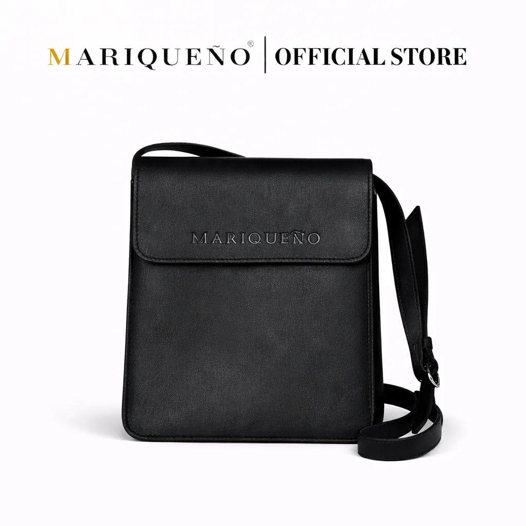 Black crossbody bag with 'Mariqueno' branding on a white background
#color_black