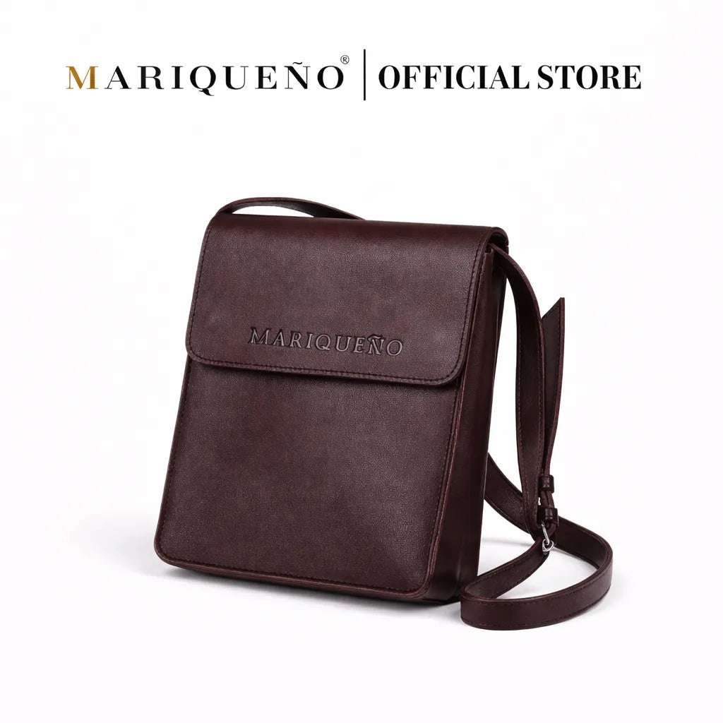 Walnut brown leather crossbody bag with 'Mariqueno' branding on a white background
#color_walnut