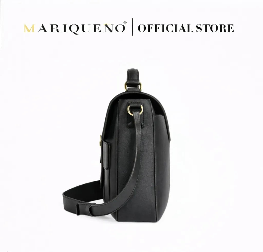 Black shoulder bag with gold accents on a white background, featuring the Mariqueno brand.
#color_black