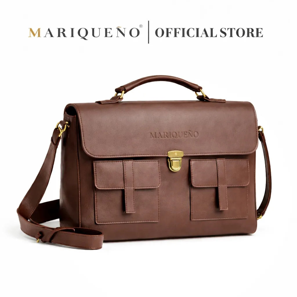 Brown leather bag with gold accents on a white background, featuring the brand 'Mariqueno'.
#color_walnut