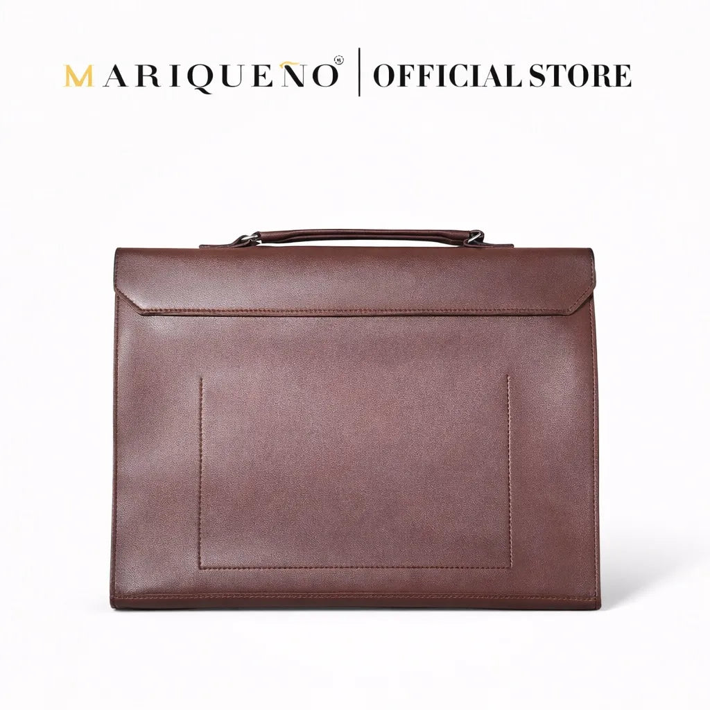 Brown leather briefcase on a white background with 'Mariqueno' branding.
#color_walnut