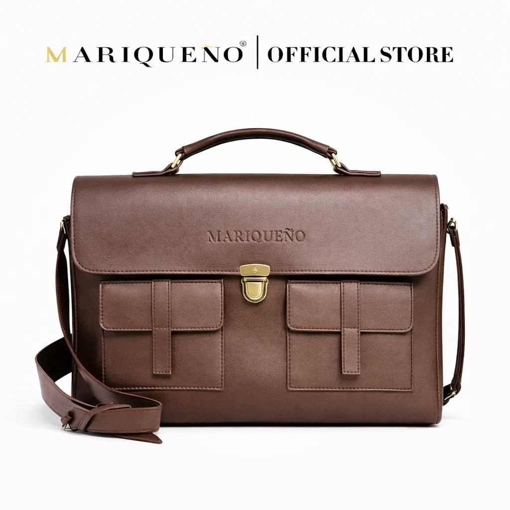 Brown leather briefcase with gold hardware on a white background, featuring the Mariqueno brand.
#color_walnut