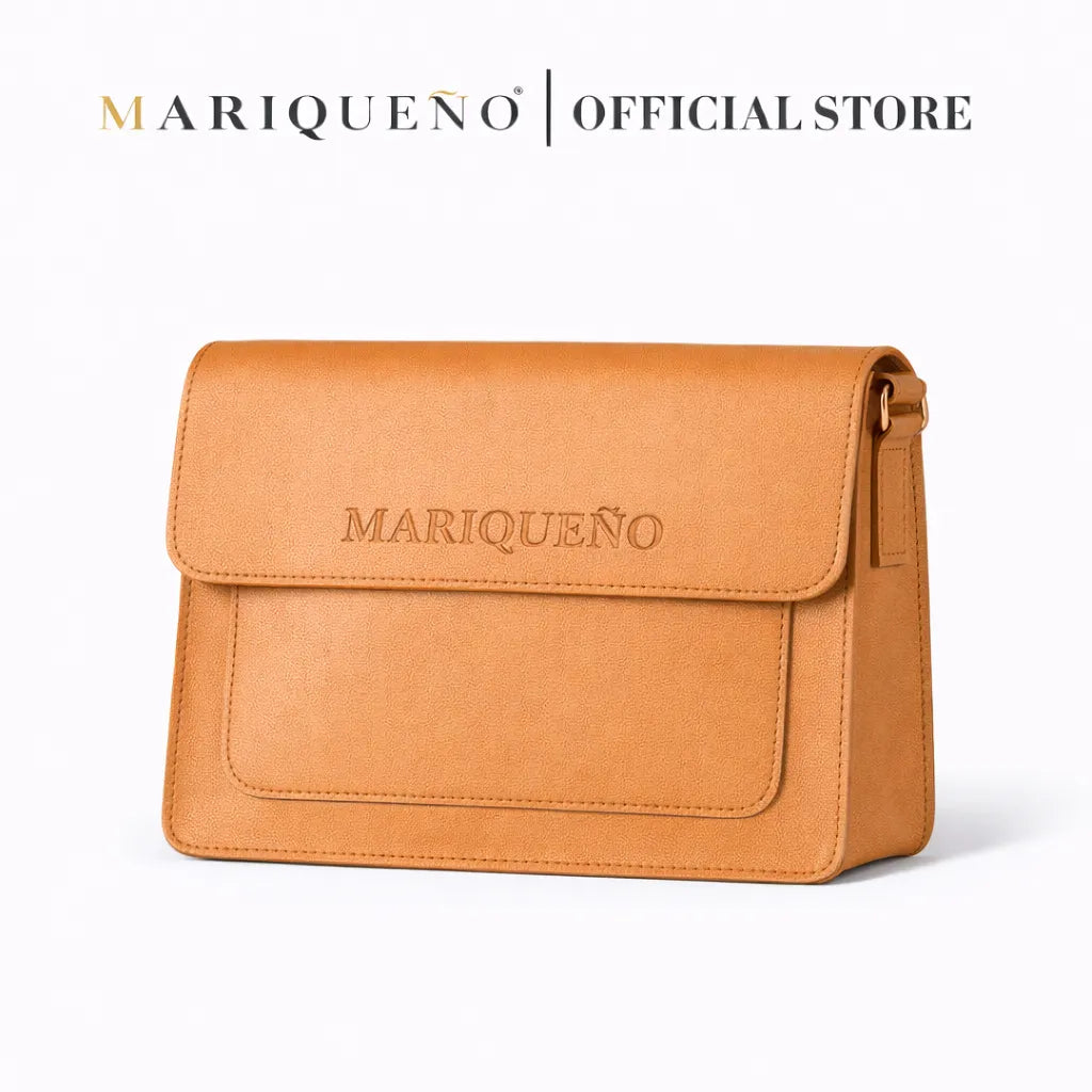 Tan handle bag with 'Mariqueño' branding on a white background
#color_tan