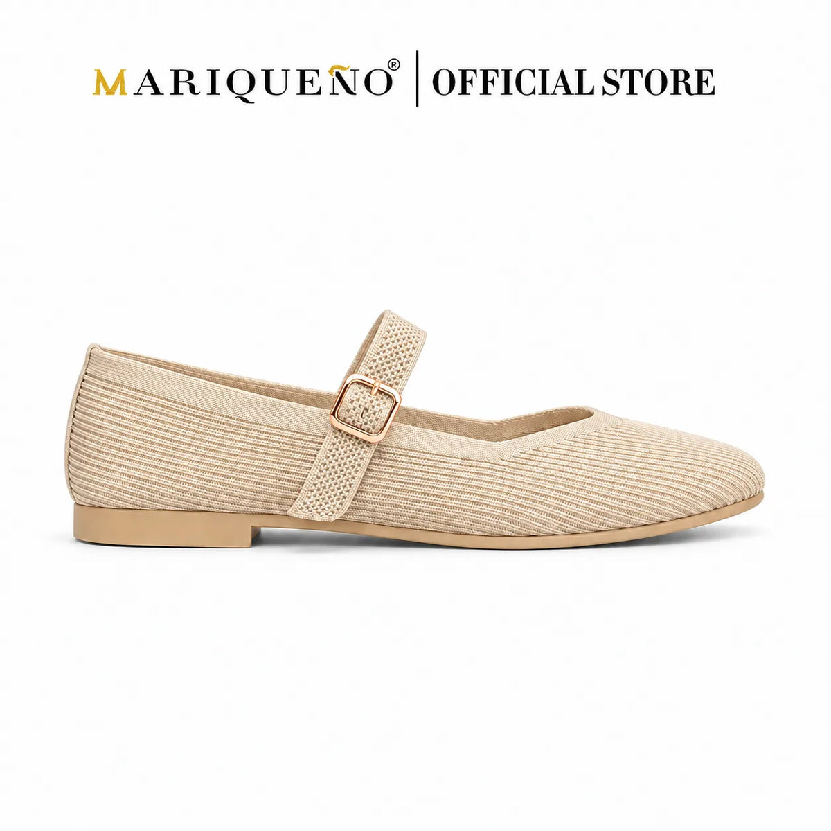 A single beige flat shoe with a textured woven upper, a strap with a gold-tone buckle, and a low tan heel, shown on a white background with the text 'MARIQUENO | OFFICIAL STORE' at the top.
#color_beige