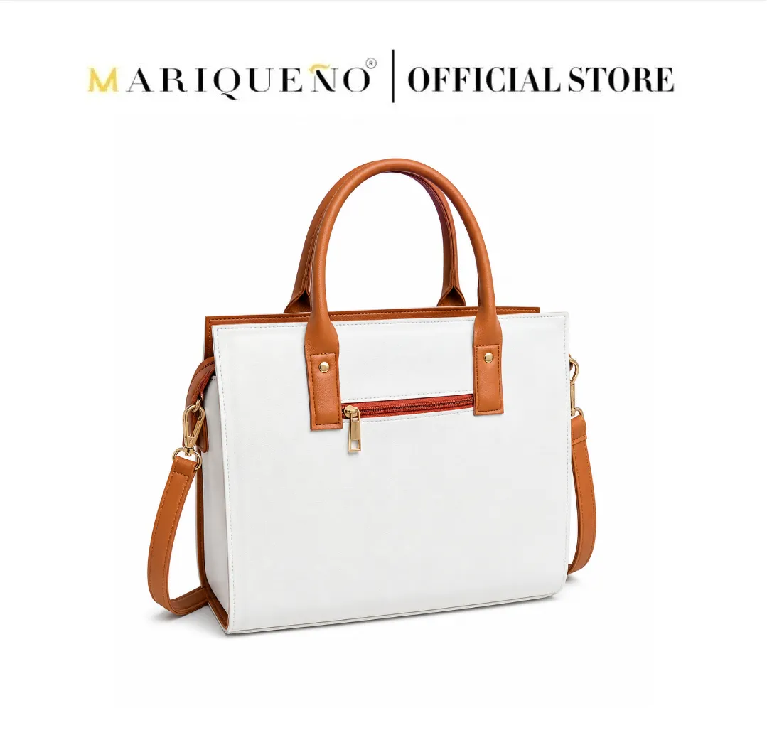 White handbag with brown handles and strap on a white background, featuring the Mariqueño brand.
#color_white