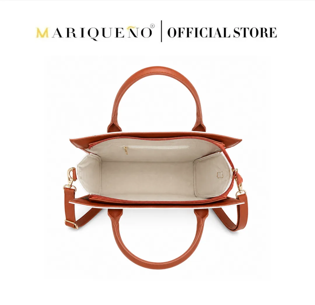 Mariqueno handbag with detailed view of hardware, slinging adjustment, and brand logo on a white background.
#color_white