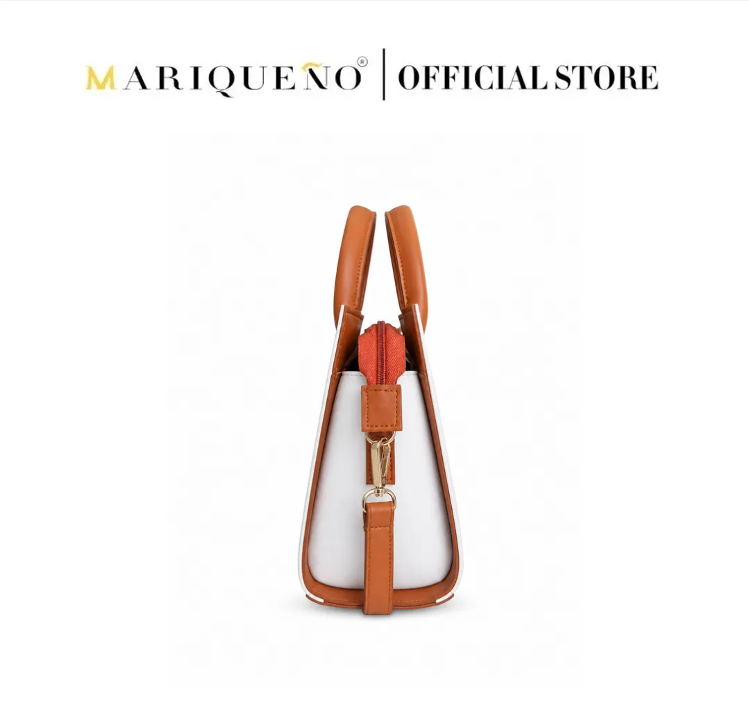 White handbag with brown straps and accents on a white background, featuring the Mariqueño logo.
#color_off white
