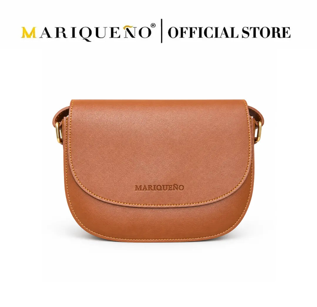 Brown shoulder bag with 'Mariqueno' branding on a white background
#color_tan brown
