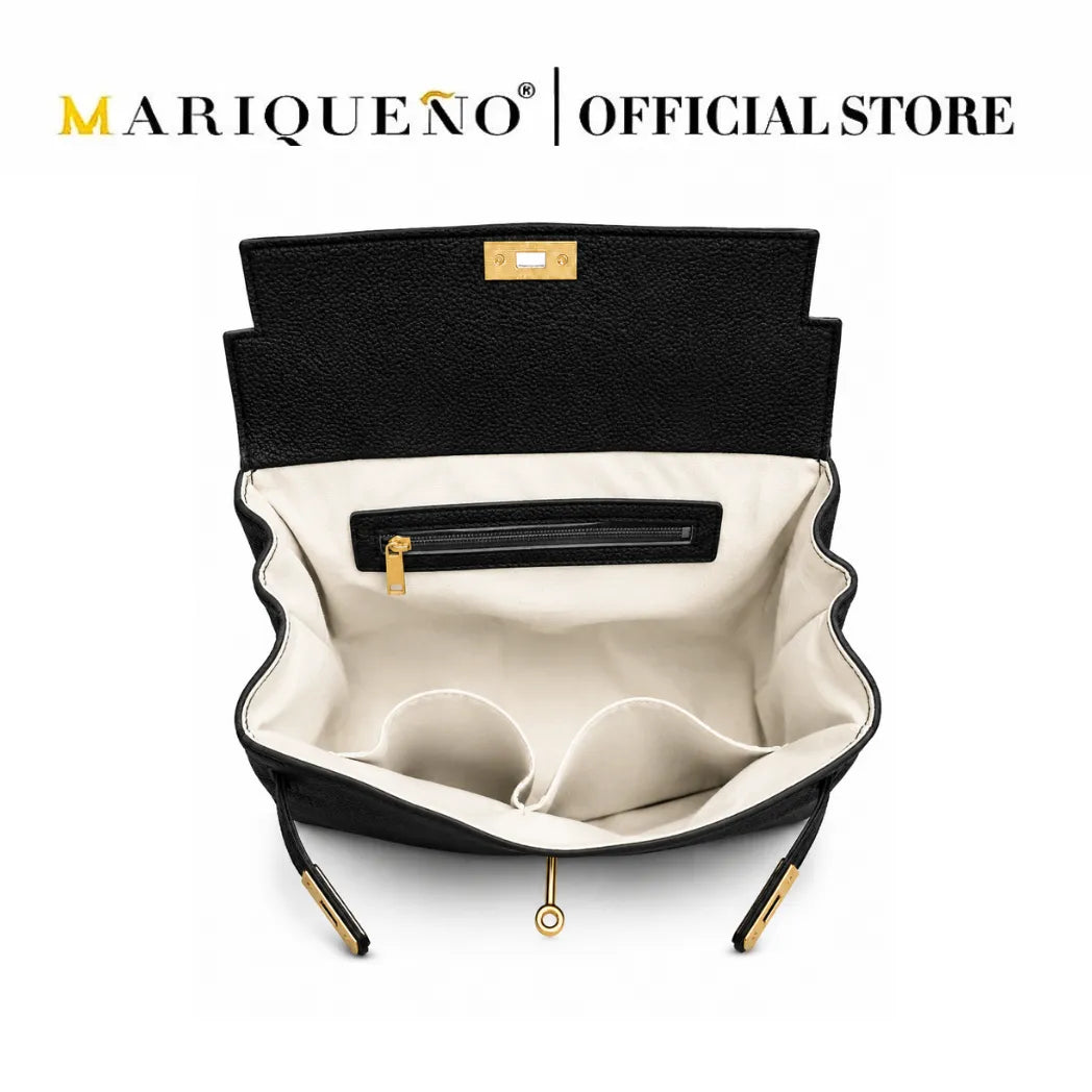 An open black textured leather clutch bag with a cream-colored interior, gold-tone zipper and hardware, and a small gold brand plaque. The brand name 'MARIQUEÑO | OFFICIAL STORE' is displayed at the top of the image.
#color_black