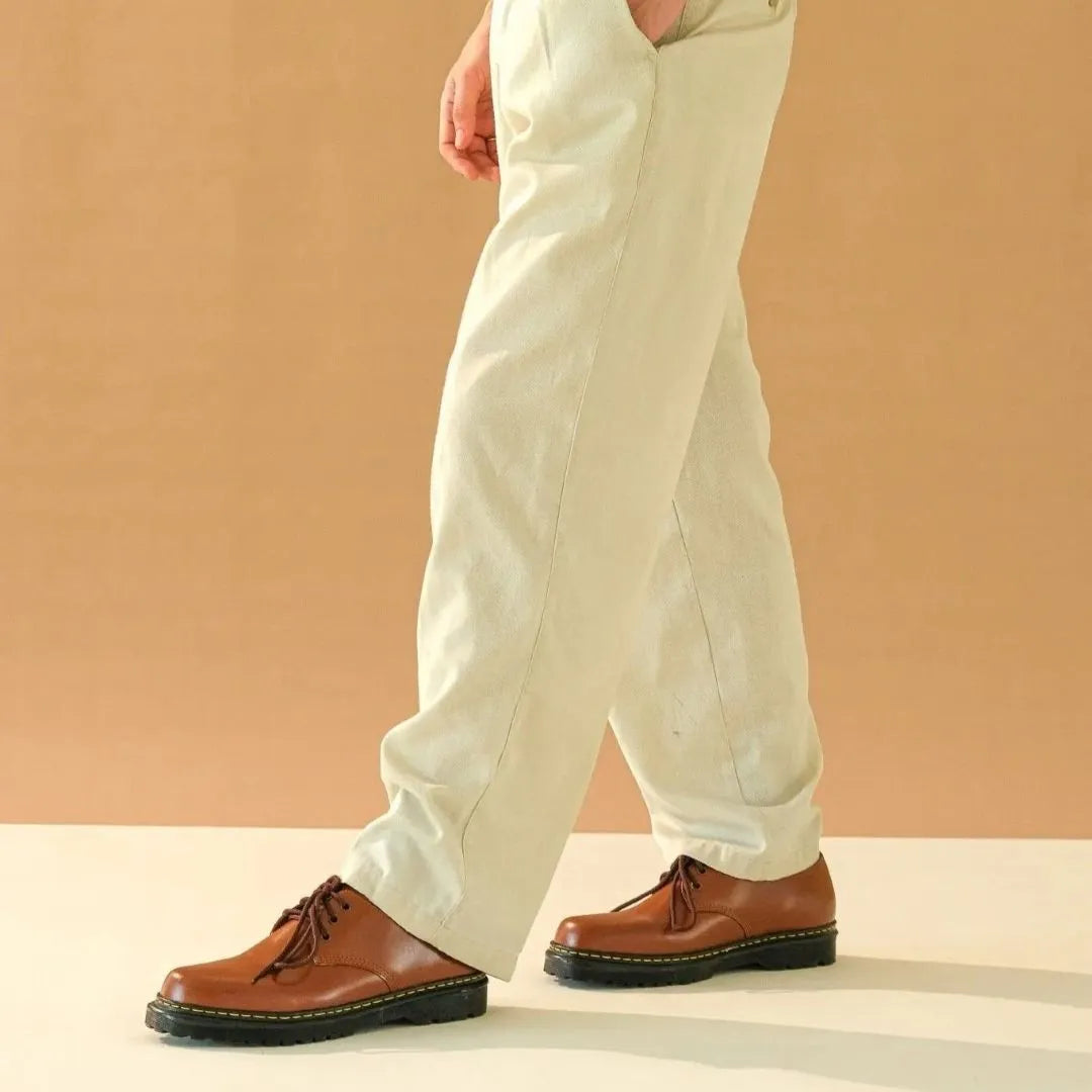 Model wearing low cut boots in Tan color
#color_tan