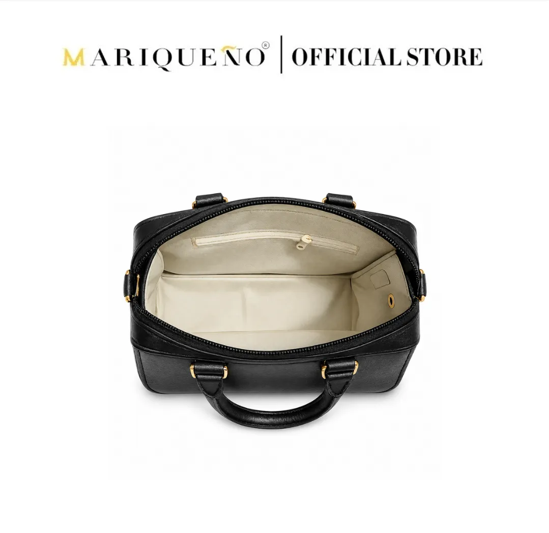 Black handbag with gold accents on a white background, featuring the Marqueno logo.
#color_black