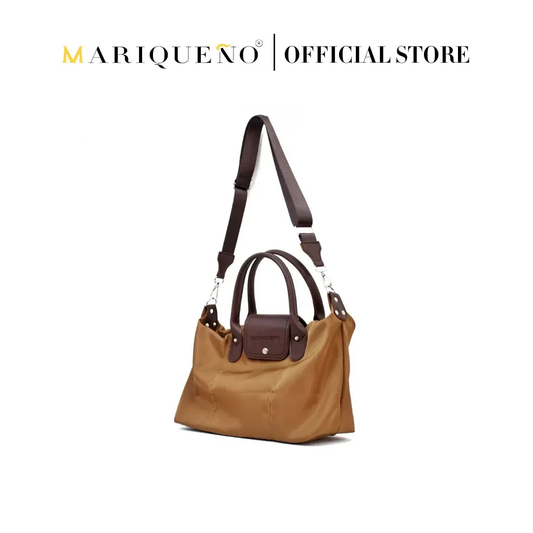 Brown handbag with a strap, displayed on a white background with 'Marqueéno' branding.
#color_coffee brown