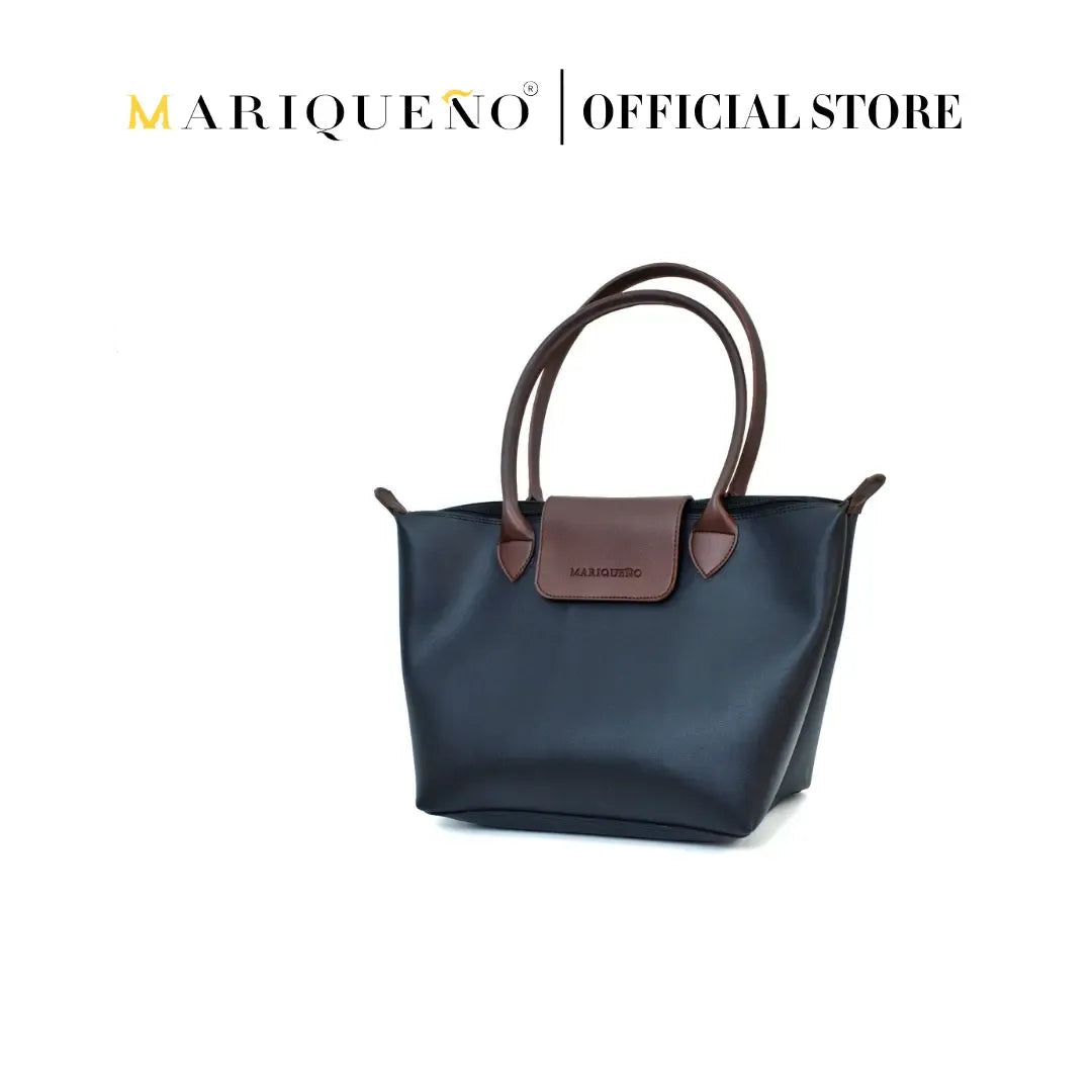 Black handbag with brown accents on a white background, featuring the Marqueéno brand.
#color_black