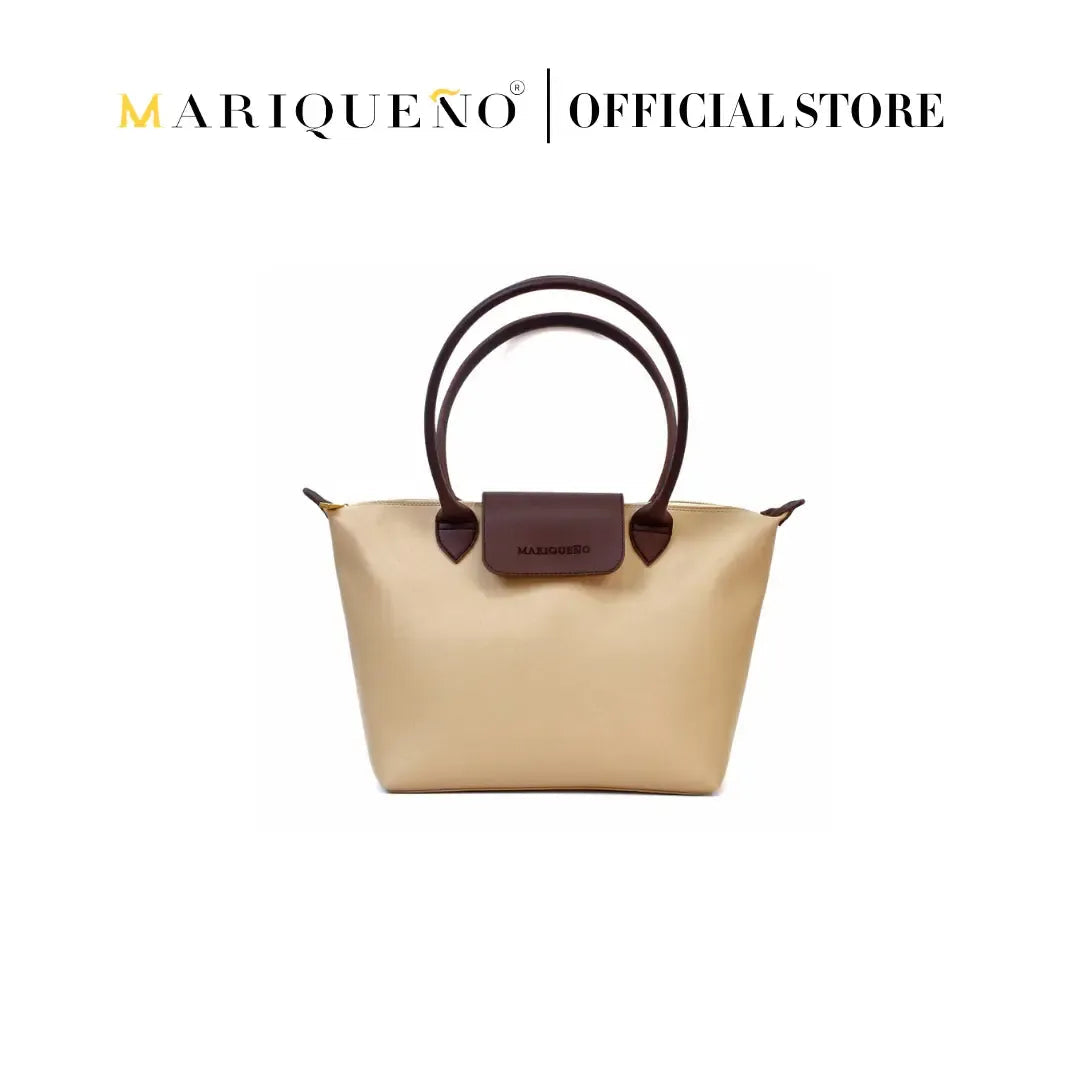 Cream handbag with brown handles and accents, featuring Marqueéno branding on a white background.
#color_cream