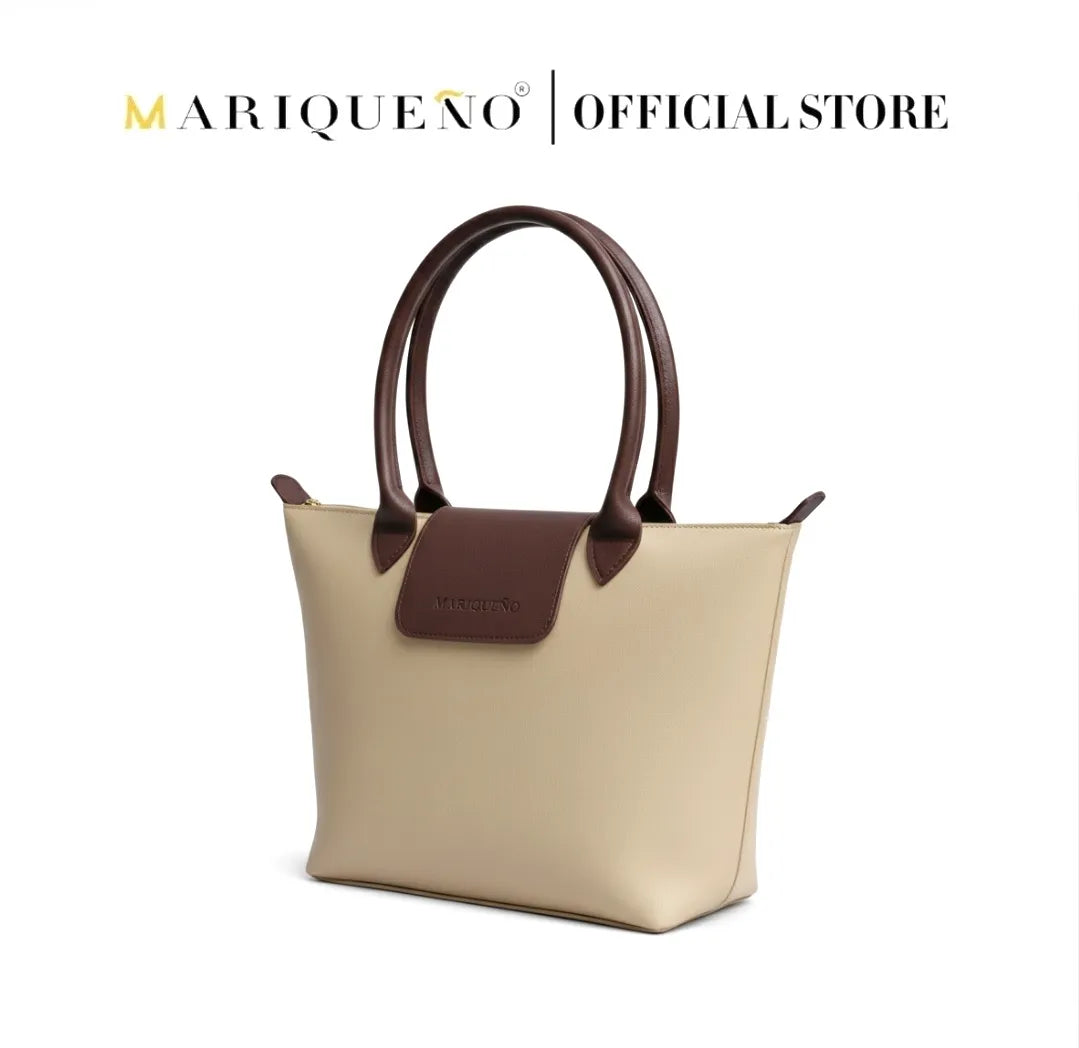 Cream handbag with brown accents and 'Marqueéno' branding on a white background.
#color_cream