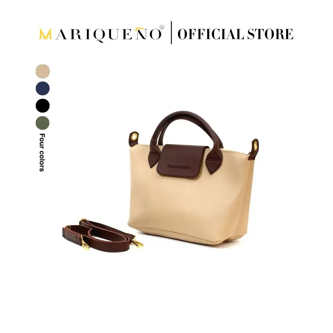 Beige handbag with brown accents and strap, featuring Mariqueno brand on a white background.
#color_cream