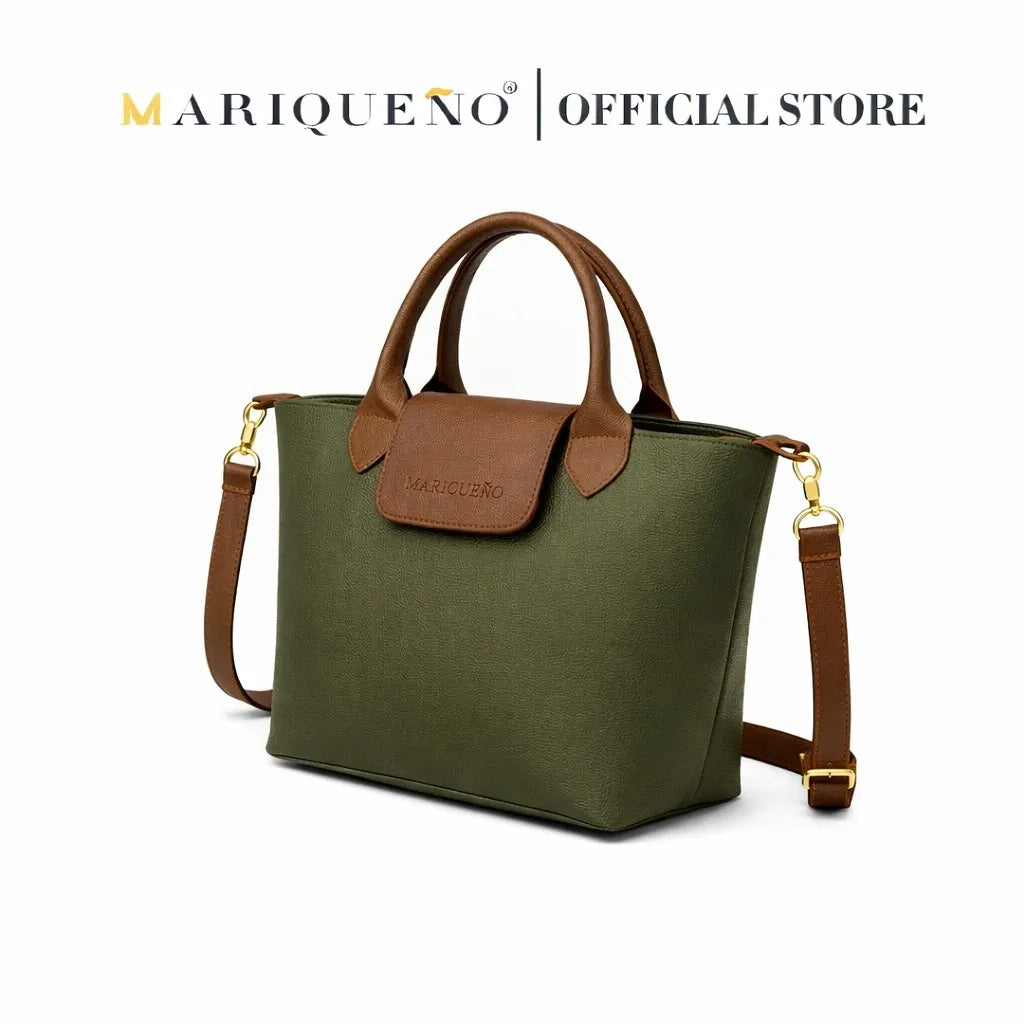 Green handbag with brown accents and strap, featuring Mariqueno branding on a white background.
#color_green