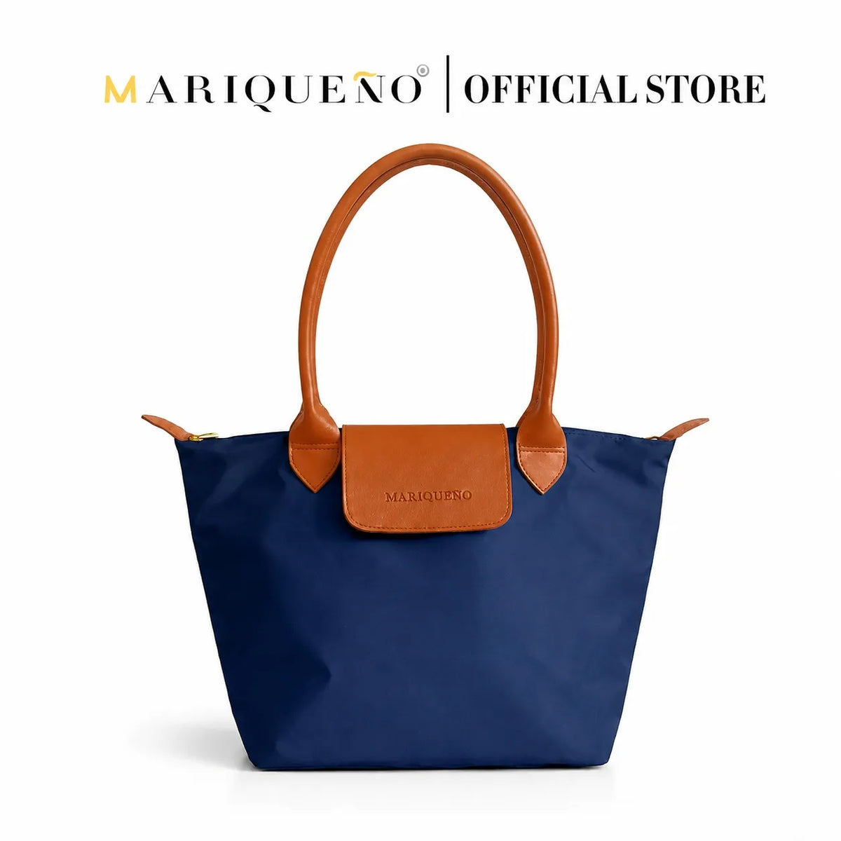 A navy blue Mariqueno tote bag with tan leather handles and front flap, shown on a white background with 'MARIQUENO | OFFICIAL STORE' text at the top.
#color_navy blue and tan