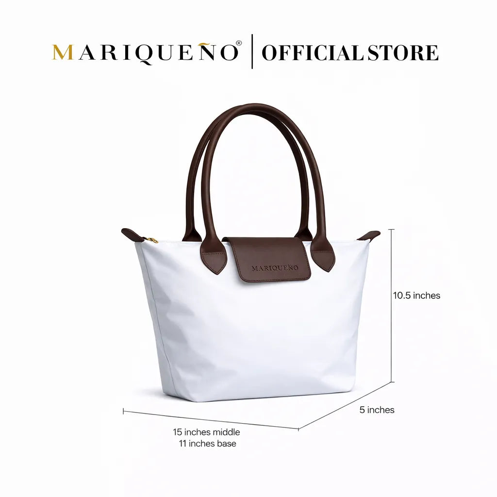 White handbag with brown handles and accents, featuring Mariqueno branding and dimensions on a white background.
#color_white