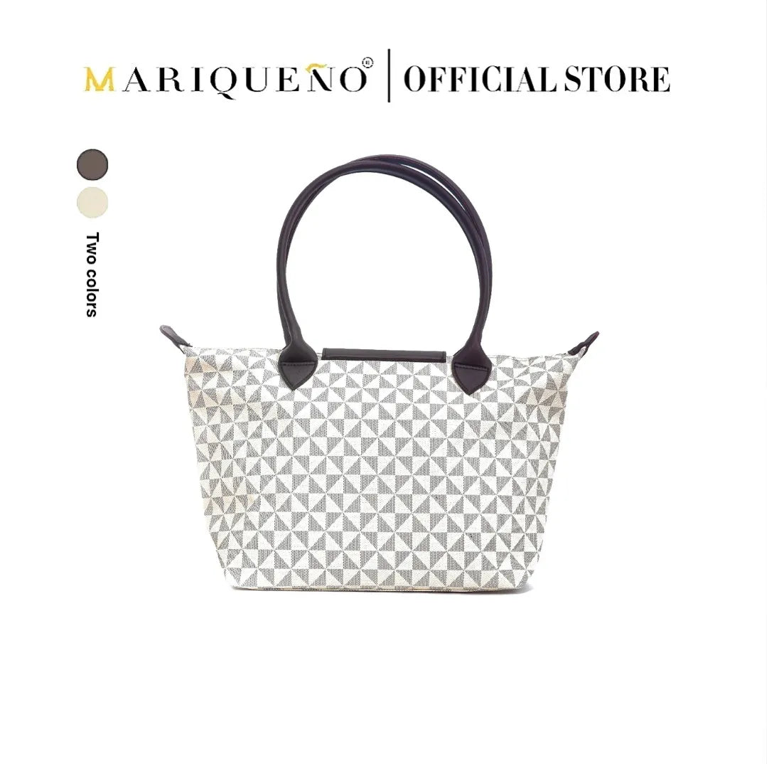 Patterned handbag with black handles on a white background, featuring the Marqueéno brand.
#color_sandstone geo