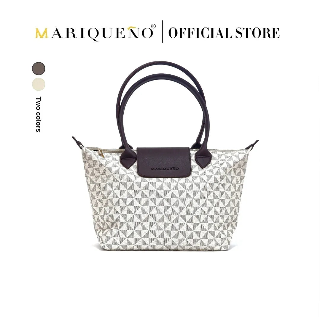 Marqueano handbag with geometric pattern and black accents on a white background
#color_sandstone geo