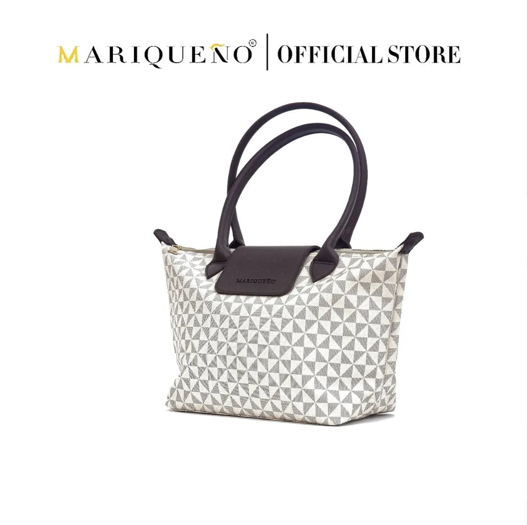 Marqueano handbag with geometric pattern and black handles on a white background
#color_sandstone geo