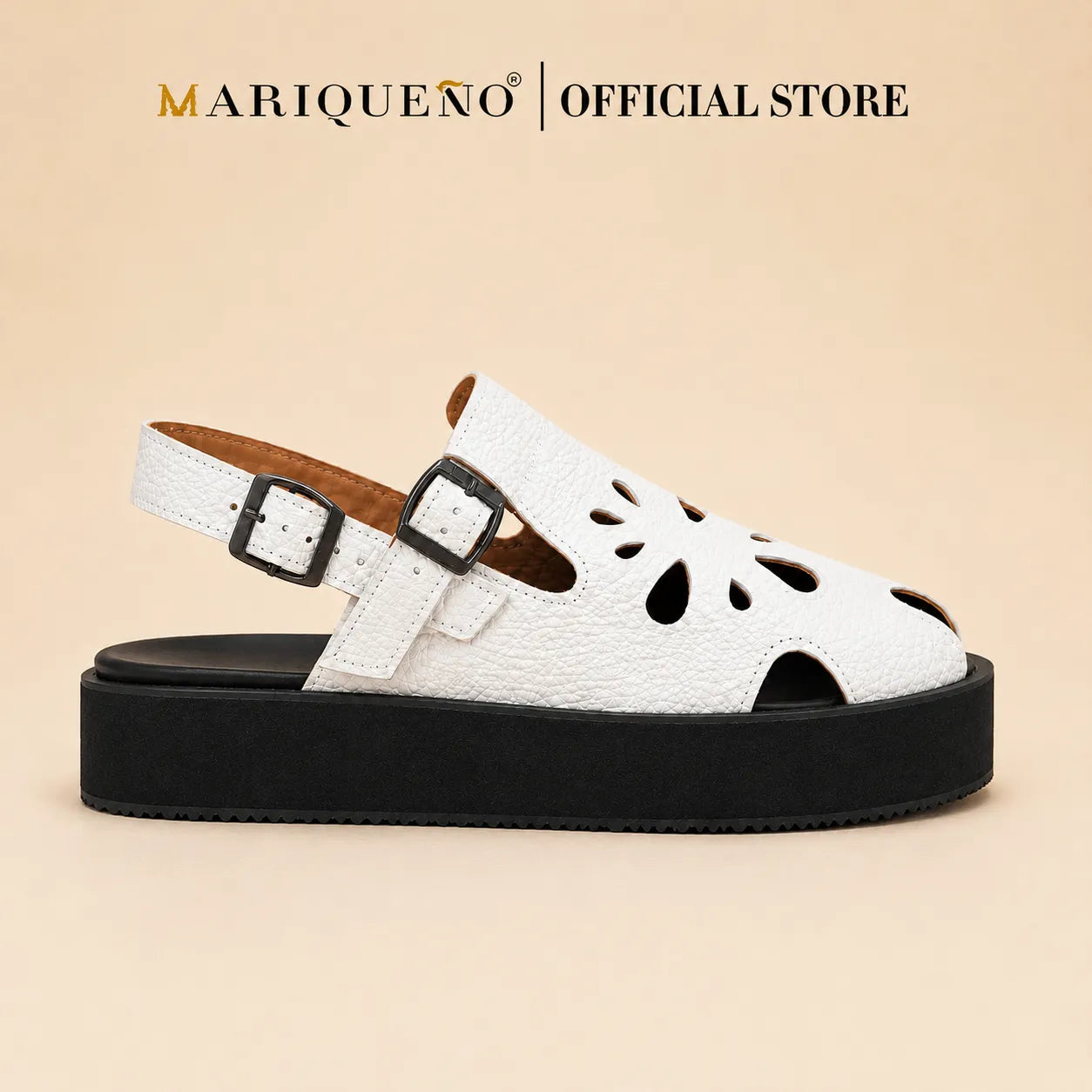 A single white textured faux-leather sandal with cutout details on the toe and heel, featuring dual buckle straps and a chunky black platform sole, shown against a plain white background with 'MARIQUENO | OFFICIALSTORE' text at the top.
#color_white