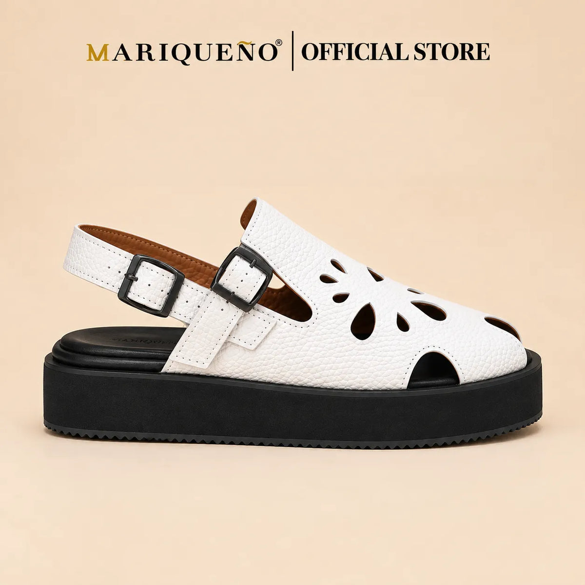 A single white textured faux-leather sandal with cutout details on the toe and heel, featuring dual buckle straps and a chunky black platform sole, shown against a plain white background with 'MARIQUENO | OFFICIALSTORE' text at the top.
#color_white