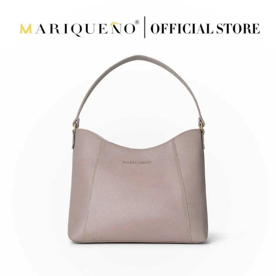 Taupe handbag with 'Mariqueno' branding on a white background
#color_taupe