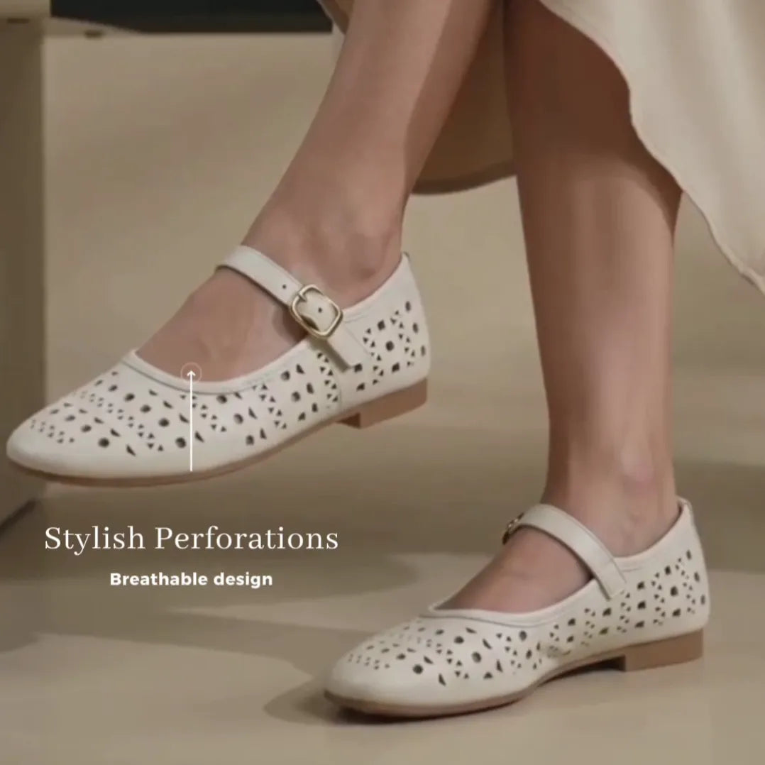 woman wearing a white mary jane flats