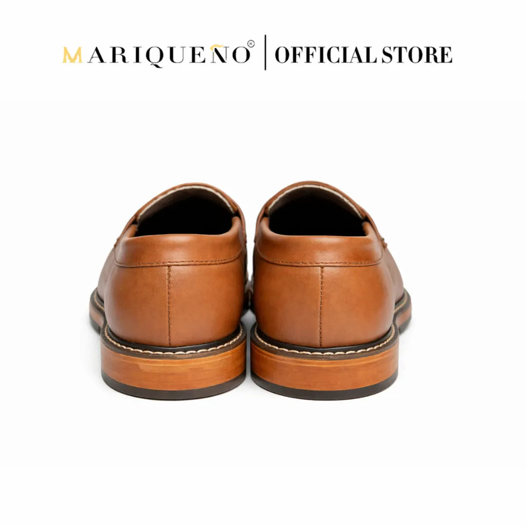 Pair of brown leather shoes with 'Mariqueno Official Store' branding on a white background.
#color_tan