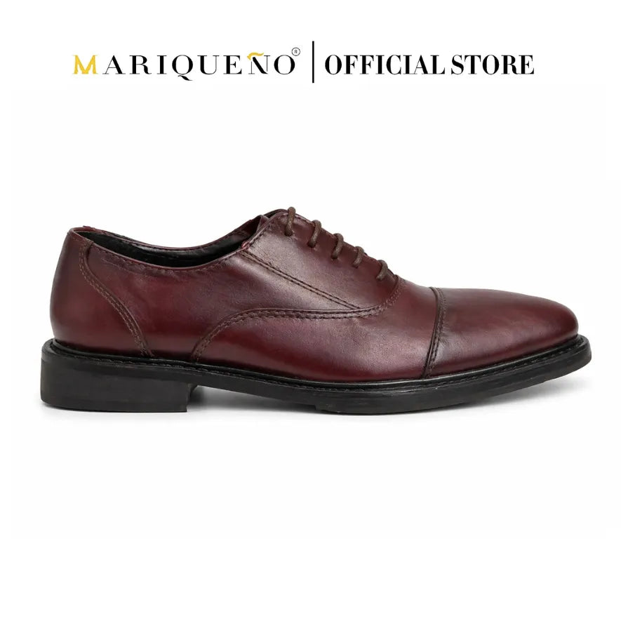 Brown leather shoe on a white background with 'Mariqueno' branding.
#color_oxblood