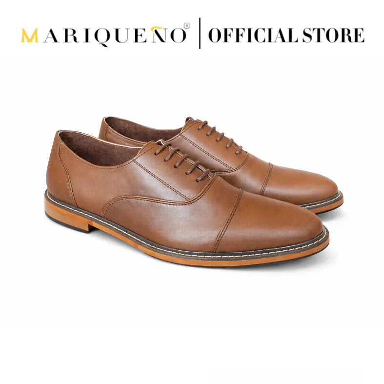 Walnut brown leather shoes with 'Mariqueno' branding on a white background
#color_walnut