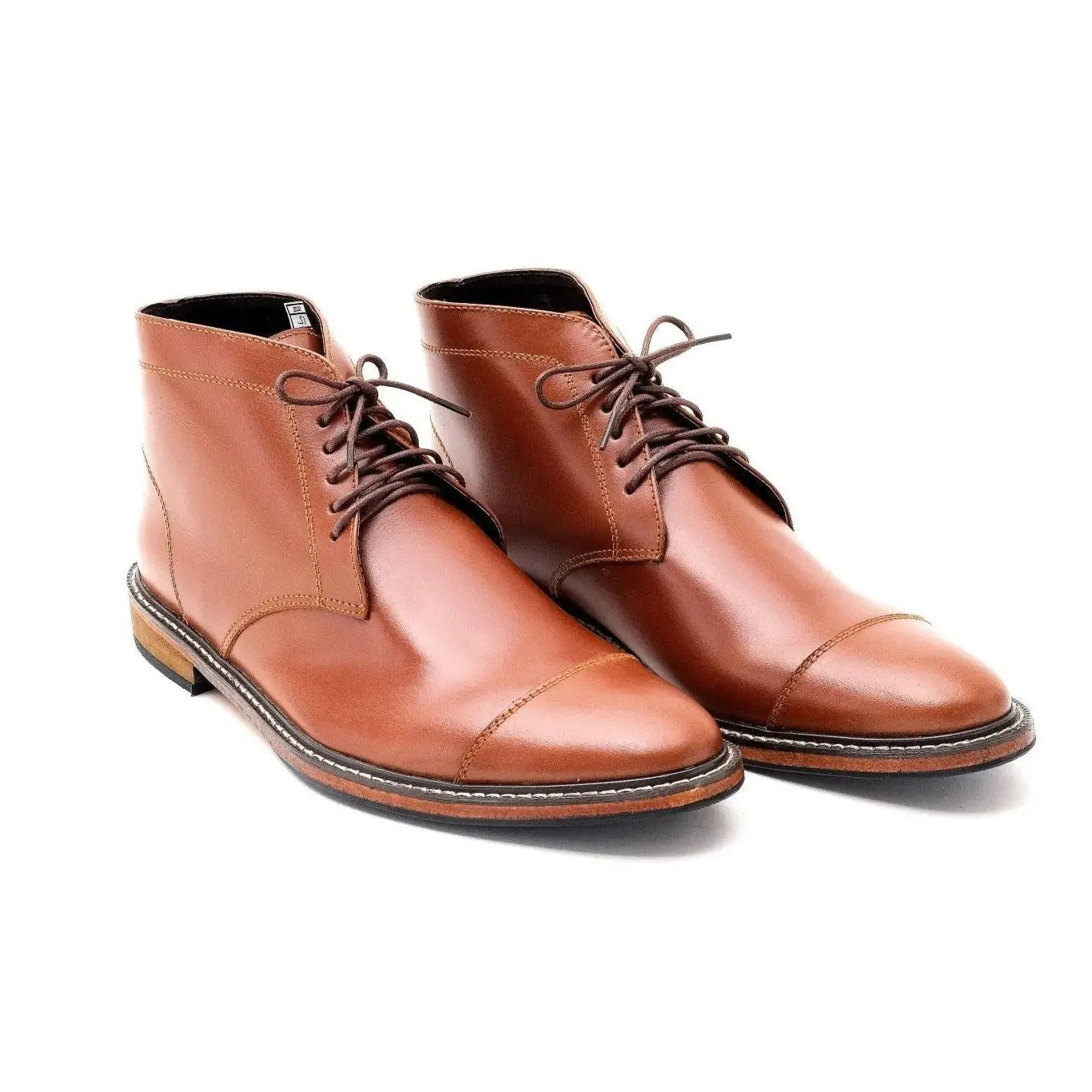 A pair of tan brown Chukka Boots
#color_tan