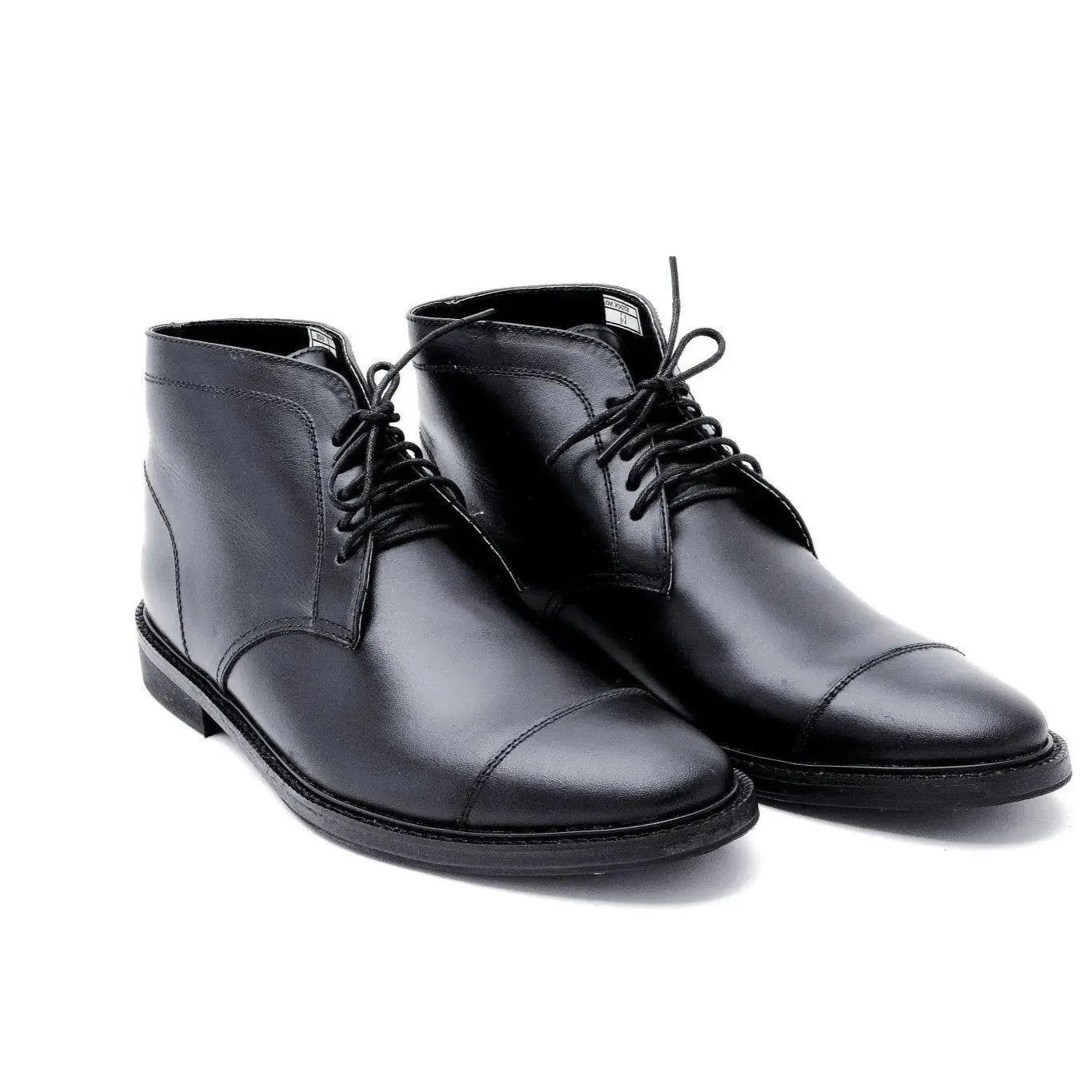 A pair of black Chukka boots 
#color_black