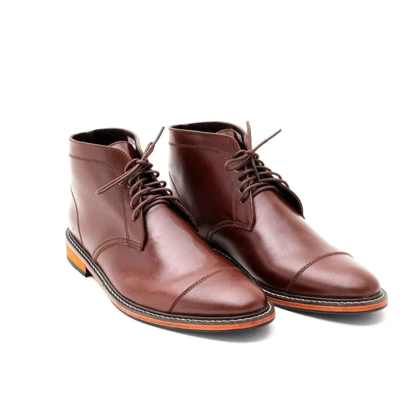 A pair of walnut brown Chukka Boots
#color_walnut