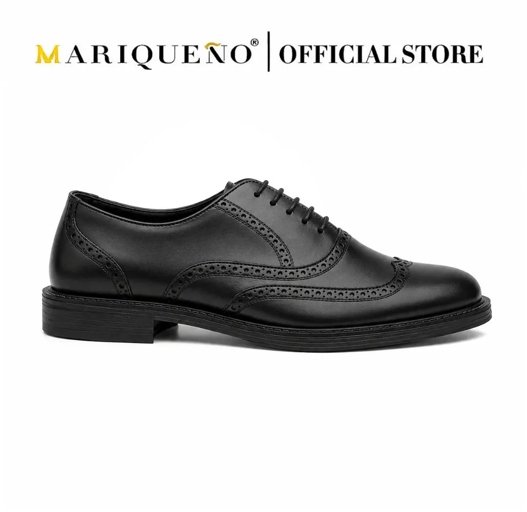 Black leather wingtip oxford shoe with 'Mariqueno' branding on a white background
#color_black