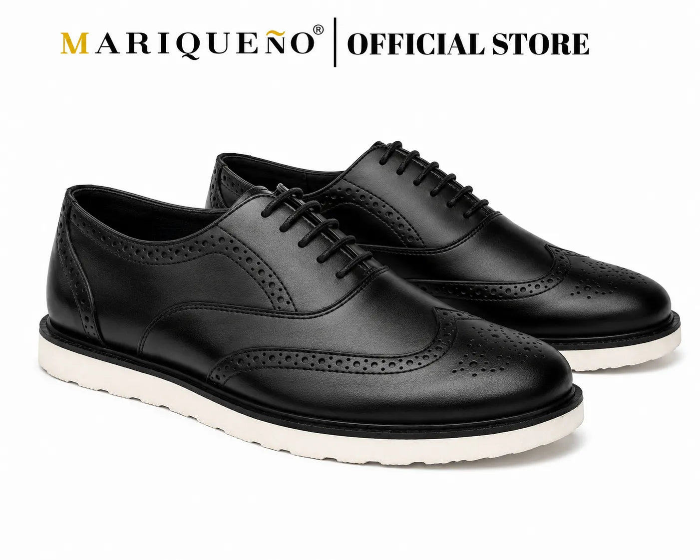 Black wingtip leather shoes with white rubber soles on a white background, featuring the Mariqueno brand.
#color_black