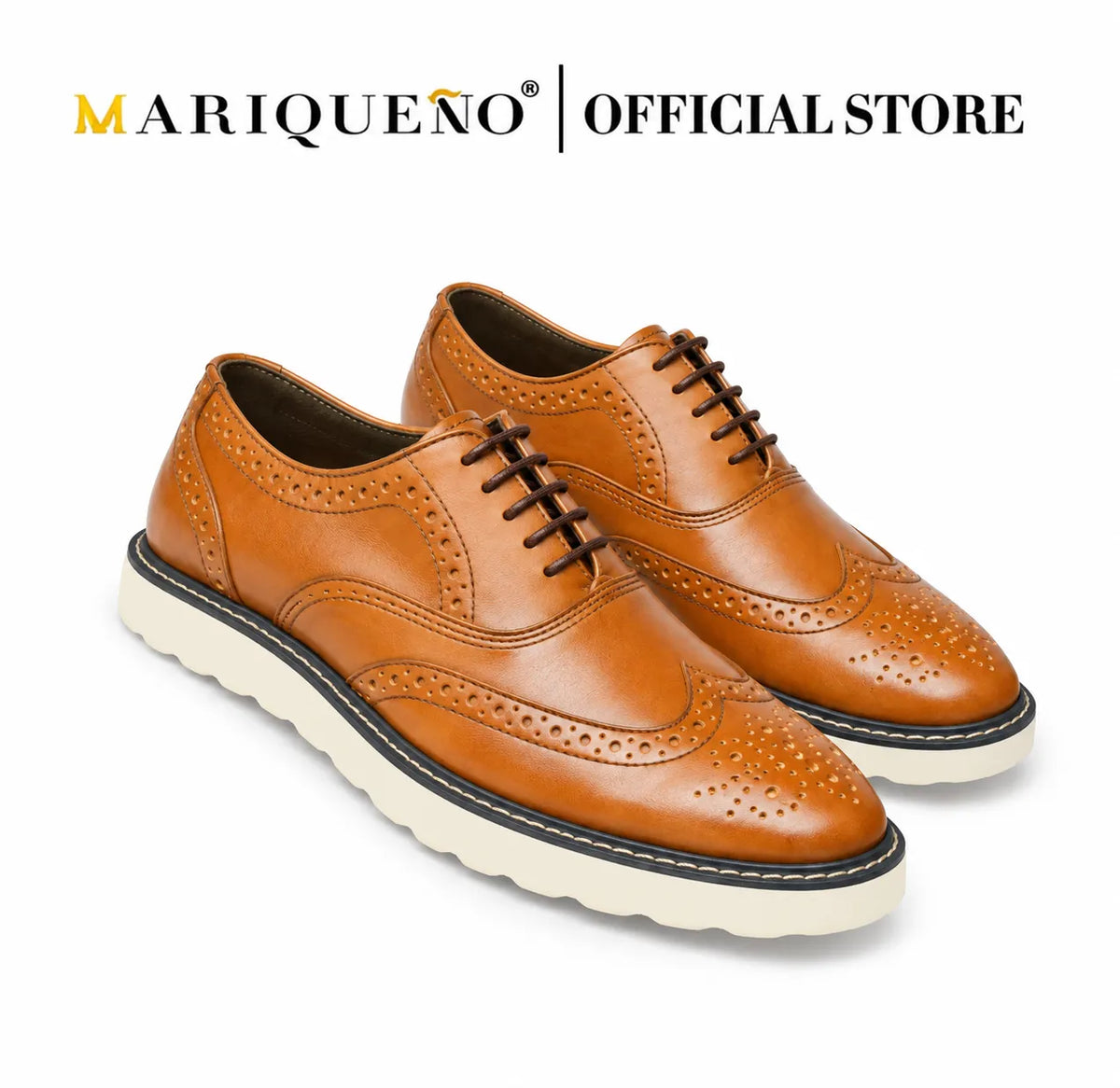 Tan brown leather shoes with white rubber soles on a light gray background, featuring the Mariqueno brand.
#color_tan