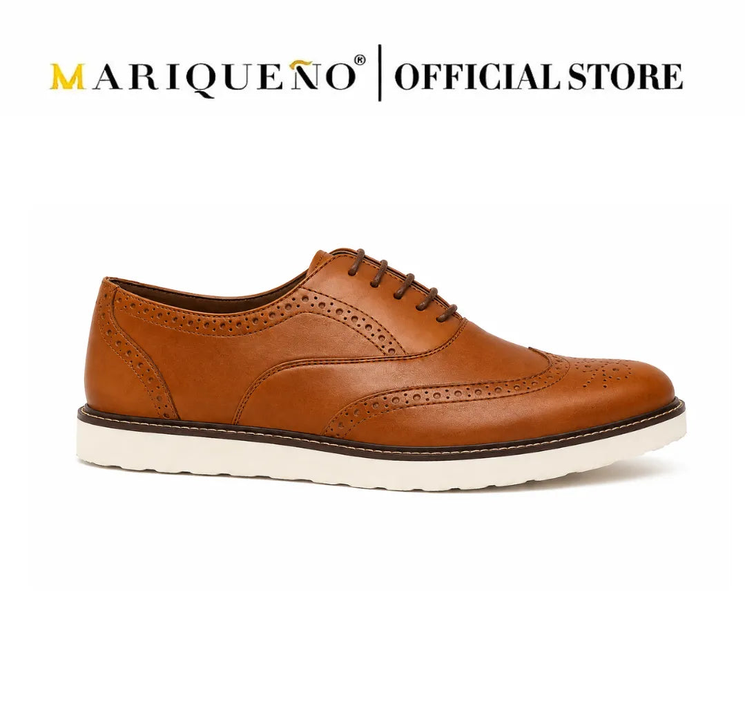 Walnut brown leather shoe with white rubber sole on a white background, branded as Mariqueno.
#color_walnut