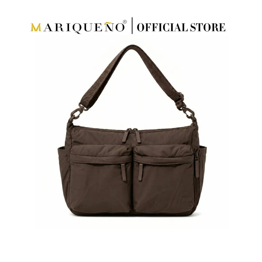 Brown handbag with multiple pockets on a white background, featuring the Mariqueno brand.
#color_coffee brown