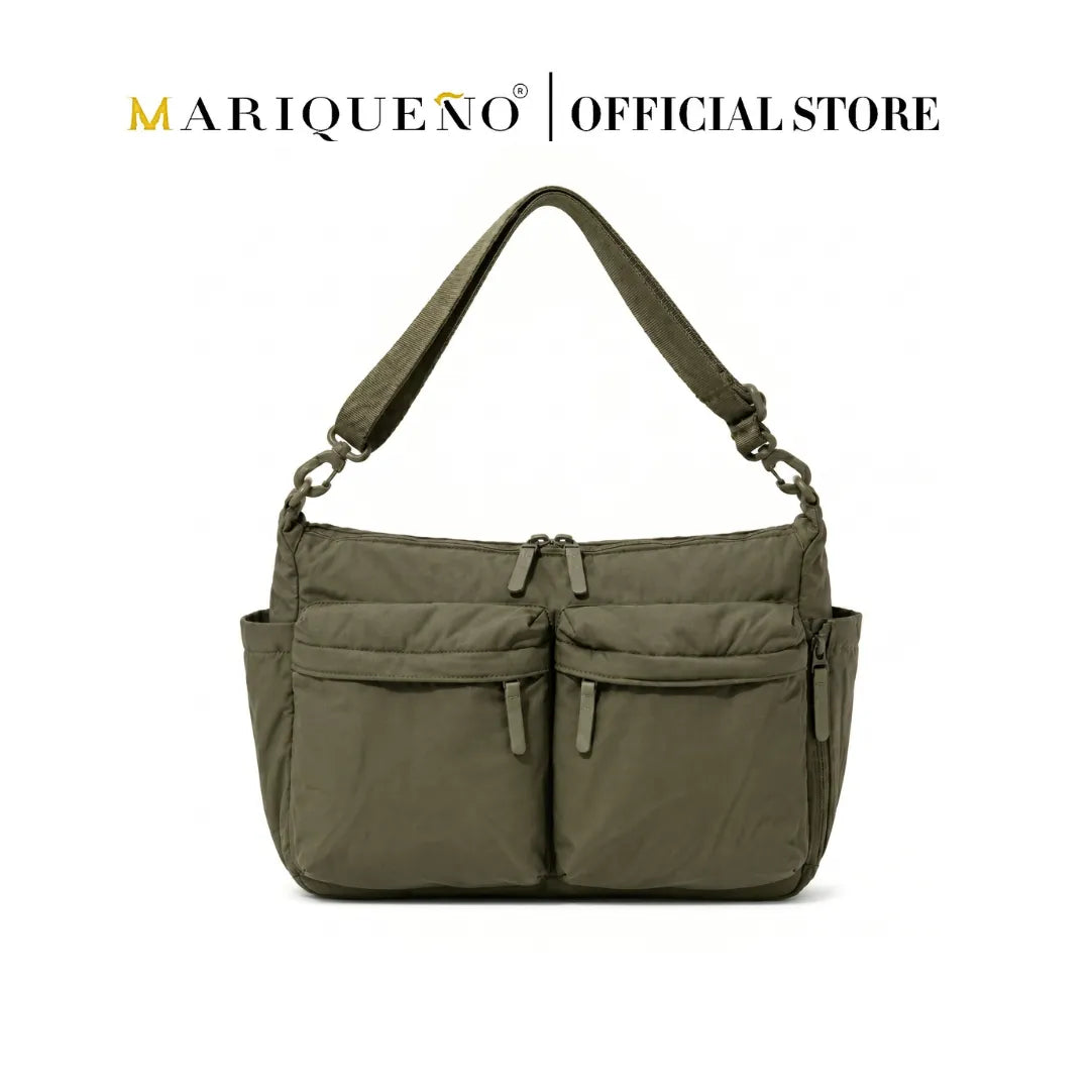 Green handbag with multiple pockets on a white background, featuring the brand 'Mariqueno'.
#color_olive green