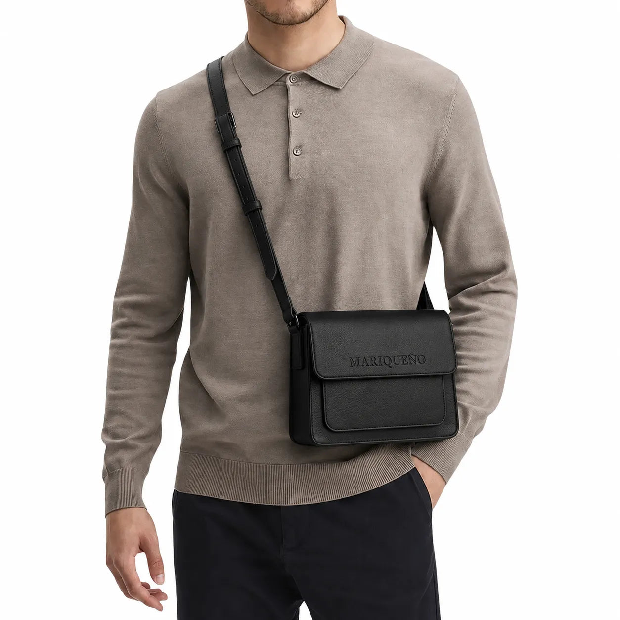 Person wearing a black sweater with a black top handle bag labeled 'MARIQUENO' on a light gray background
#color_black