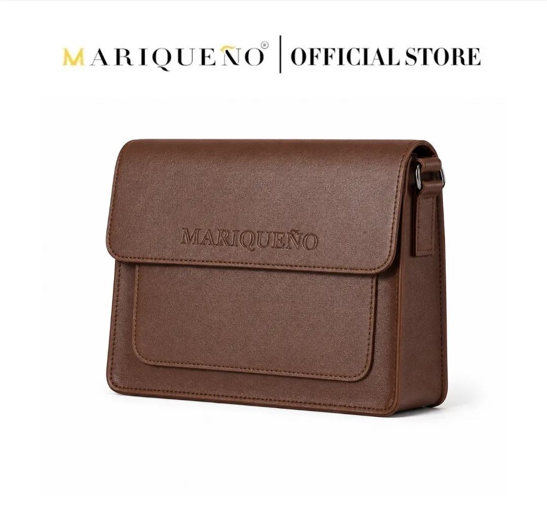 Walnut brown leather bag with 'Mariqueno' branding on a white background
#color_walnut